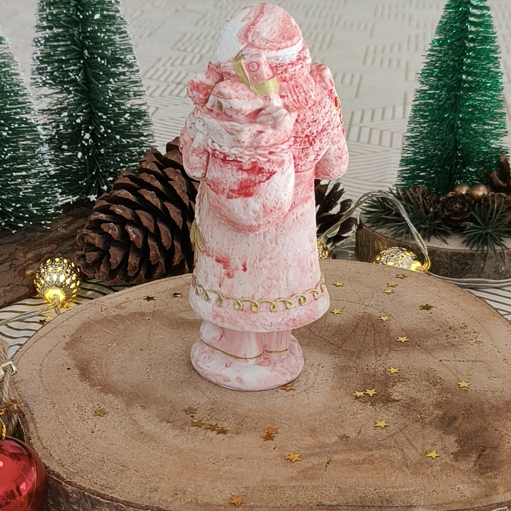 Le père Noël vue de dos en jesmonite par Melissanacrea